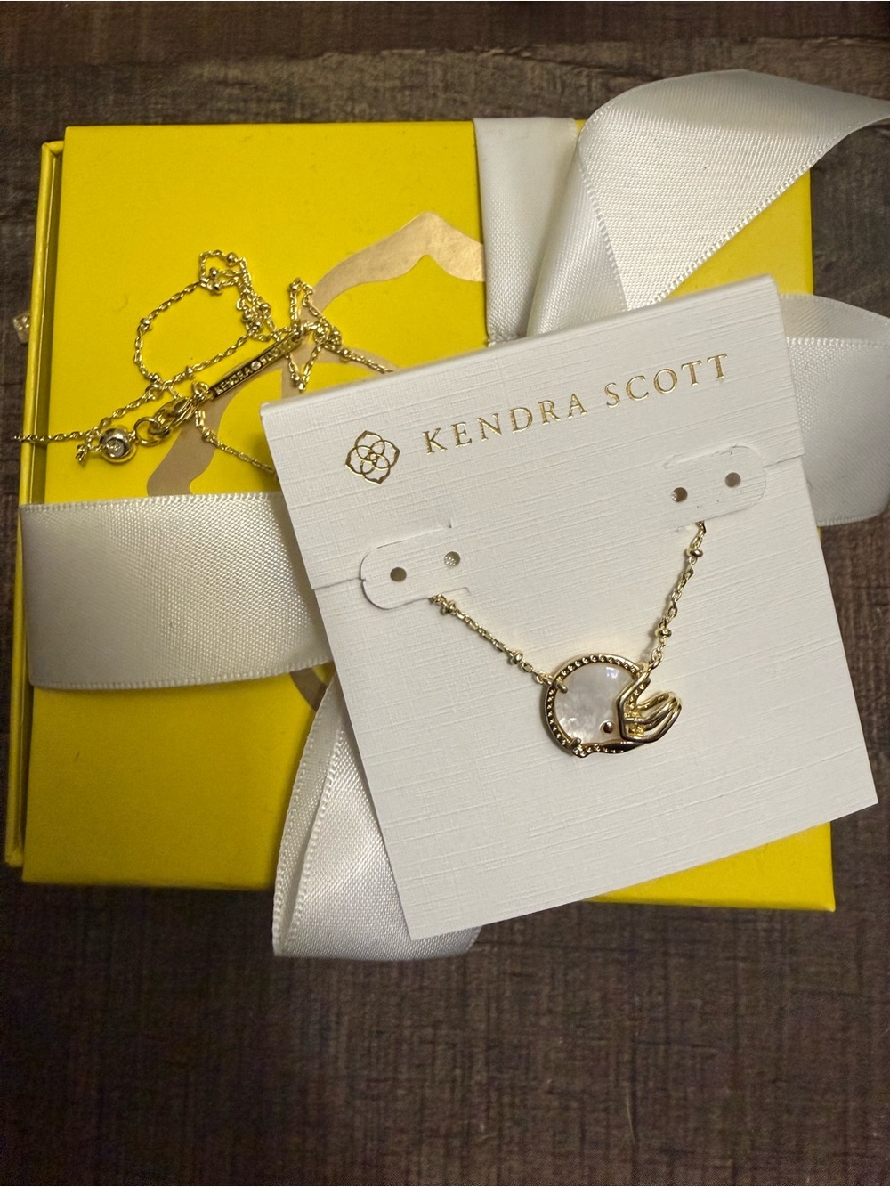 Kendra Scott football helmet necklace